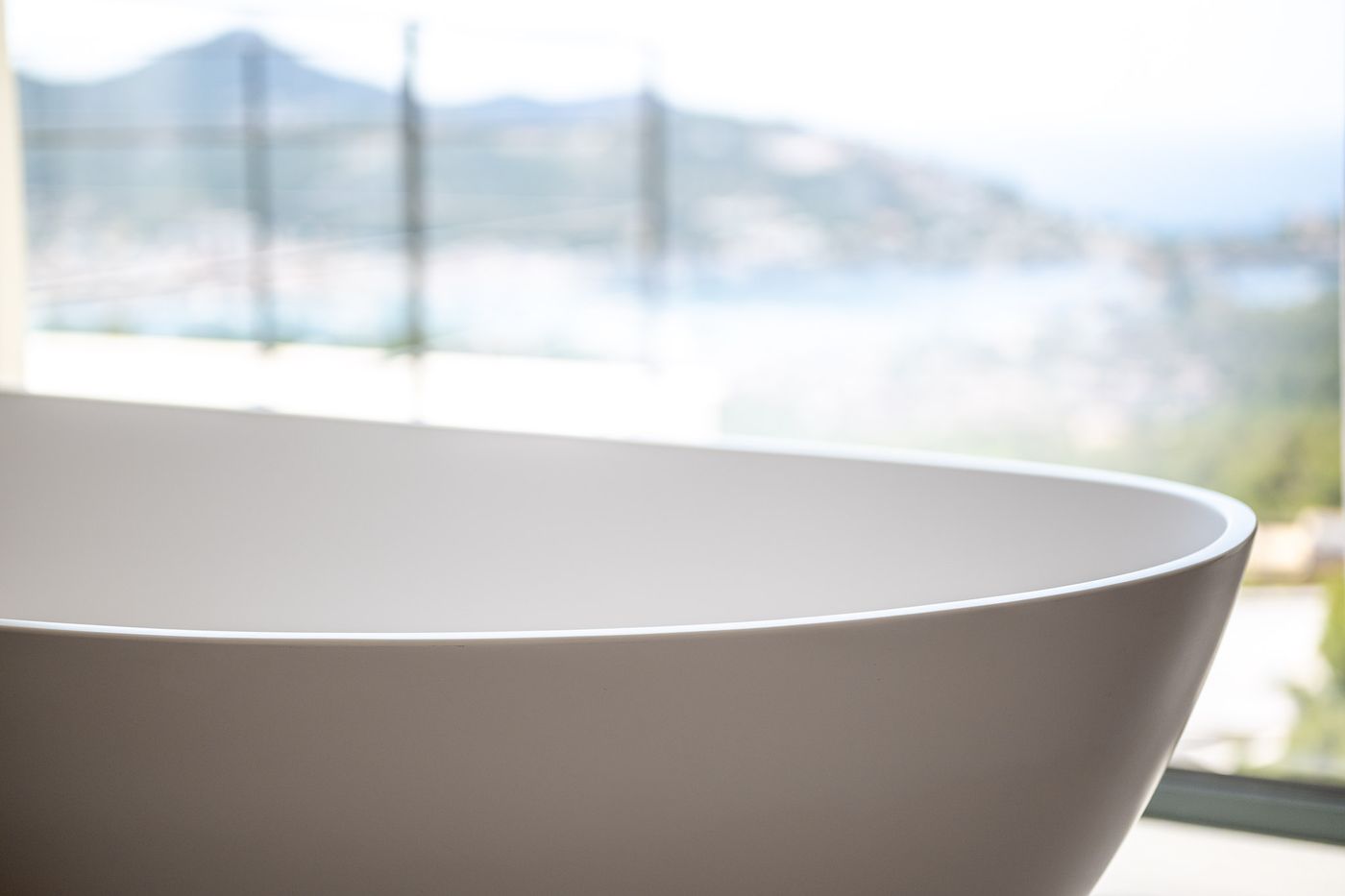 Free-standing wellness bath overlooking the bay