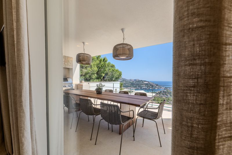 Lounge seating opening onto the sea-view terrace